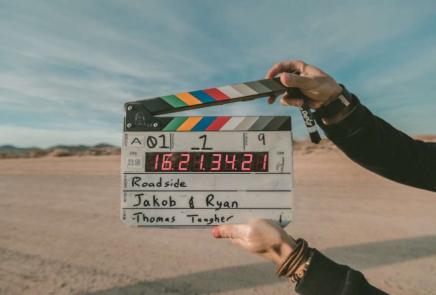 A film clapperboard held up on location at the start of a take